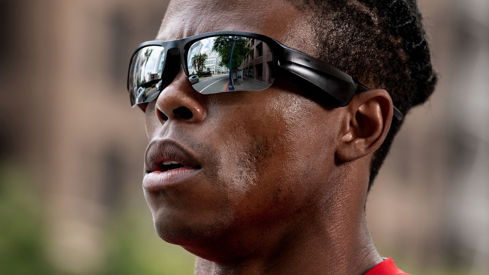 Guy wearing Bose sport sunglasses