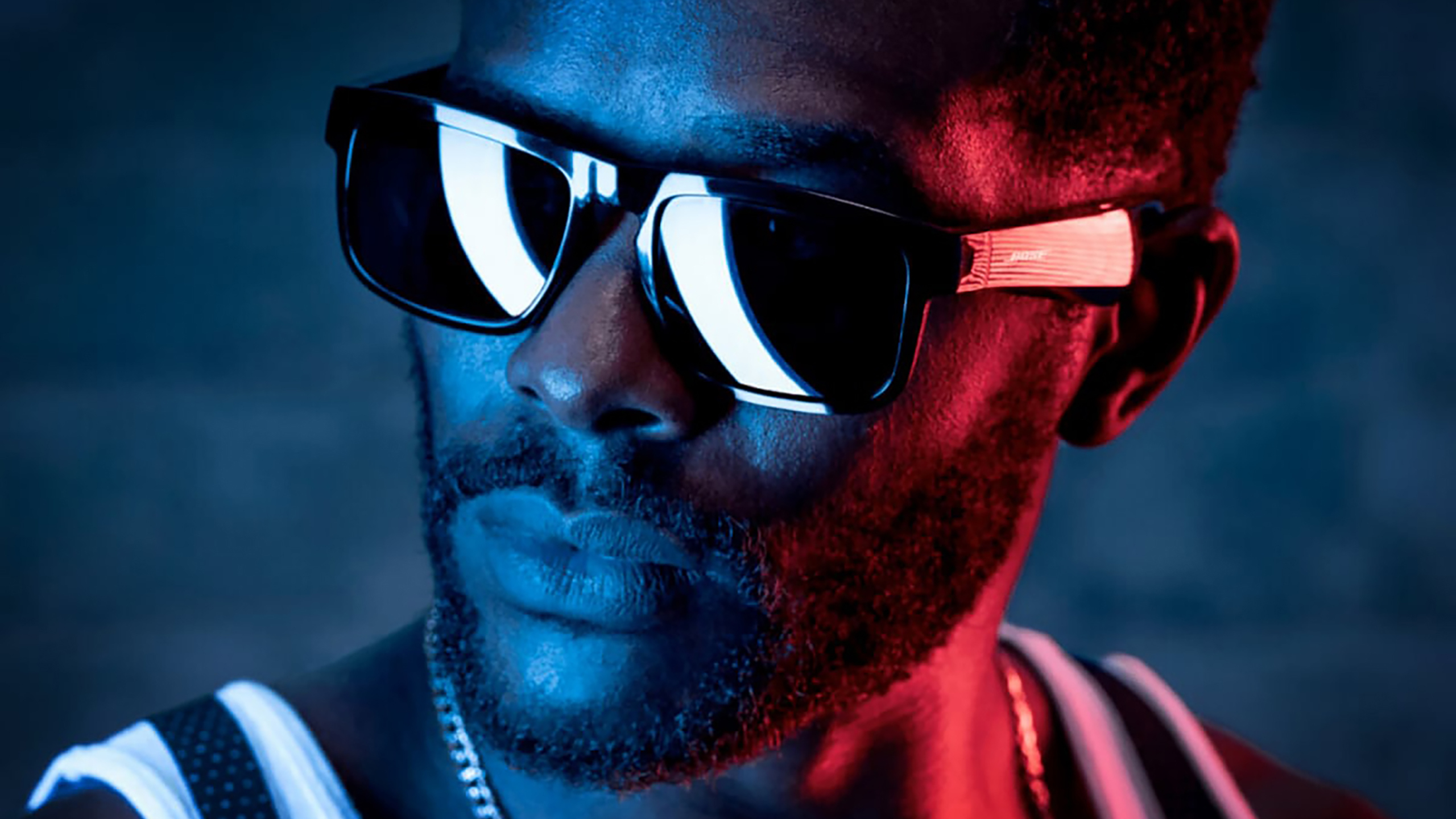 man wearing Bose sunglasses at night